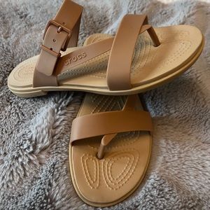 Crocs sandals size 8 in tan. Like new!
